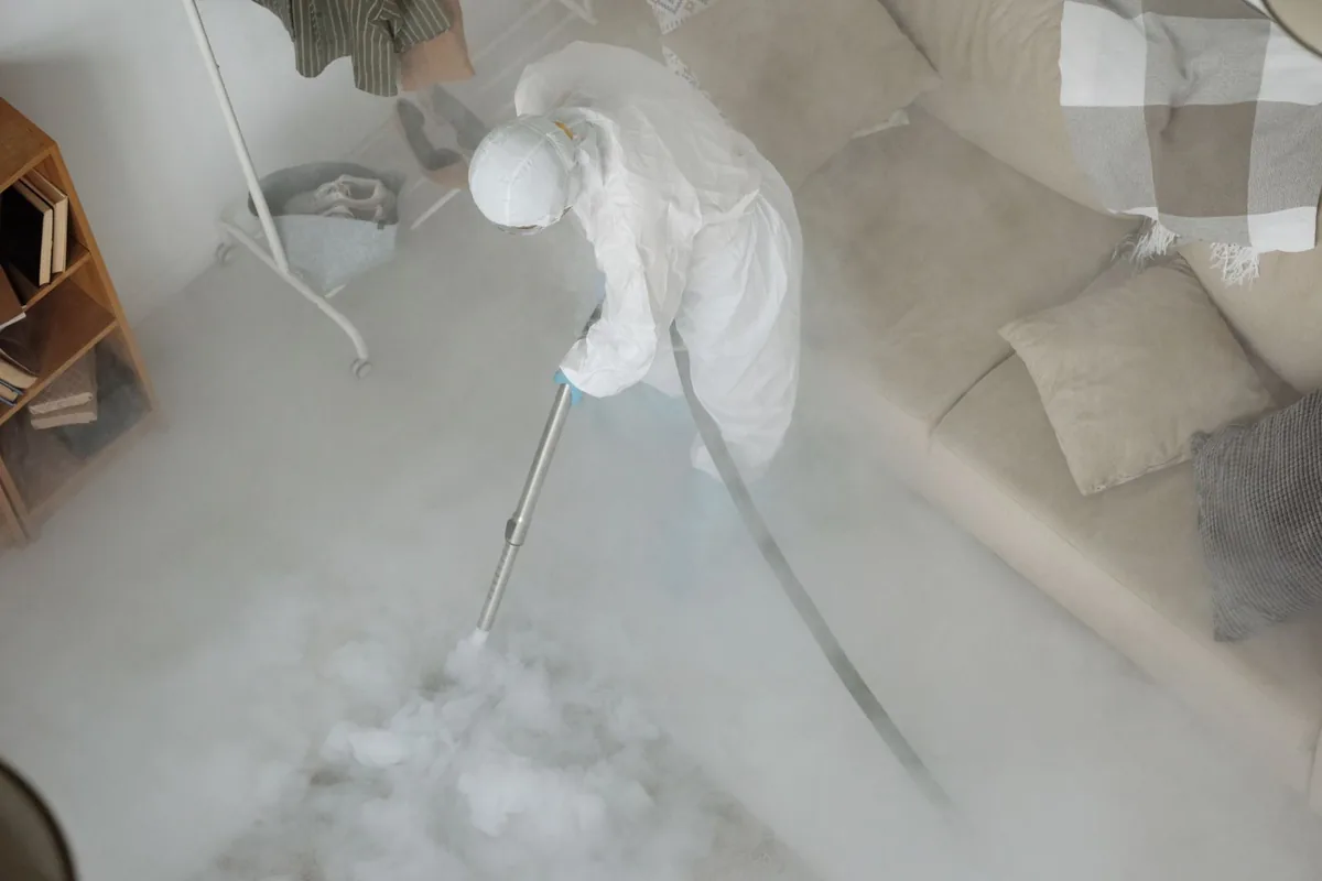 Biohazard cleanup technician in protective equipment, Salton City, CA